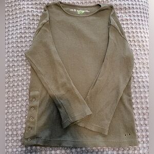 Women’s small oversized waffle long sleeve with side buttons and grommet detail.